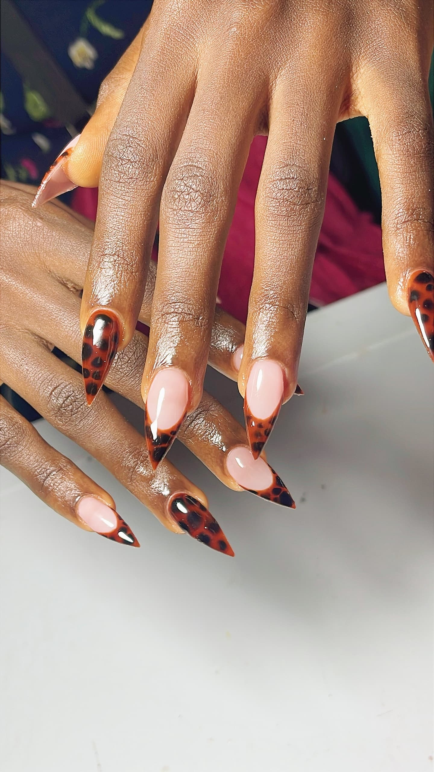 Gel nails in leopard design, we offer the best services.